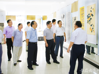 【华体会平台】淮北师大举行庆祝中国共产党成立95周年暨红军长征胜利80周年书画展